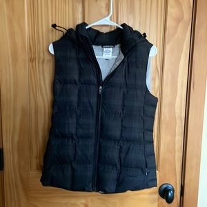 Patagonia down puffy vest rarely worn size medium, cute plaid, removable hood.